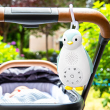 Load image into Gallery viewer, Zazu Sound Machine - Zoë the penguin in blue in stroller