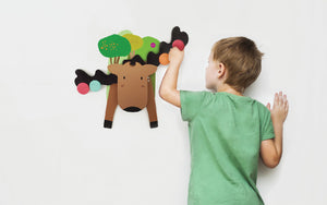 Child using Oribel VertiPlay Goofy Moose Balancer