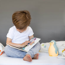 Load image into Gallery viewer, Zazu - Pam the Penguin Sleeptrainer blue in orange light
