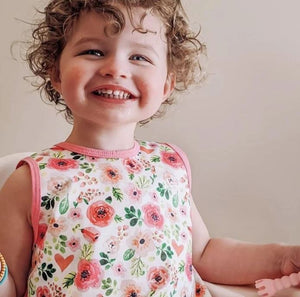 Toddler using BapronBaby Bubblegum Floral Bapron Bib-Apron