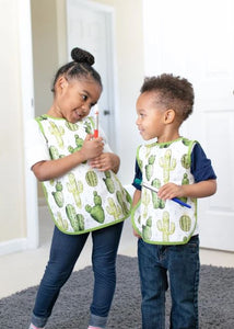 Toddler using BapronBaby Desert Cactus Bapron Bib-Apron